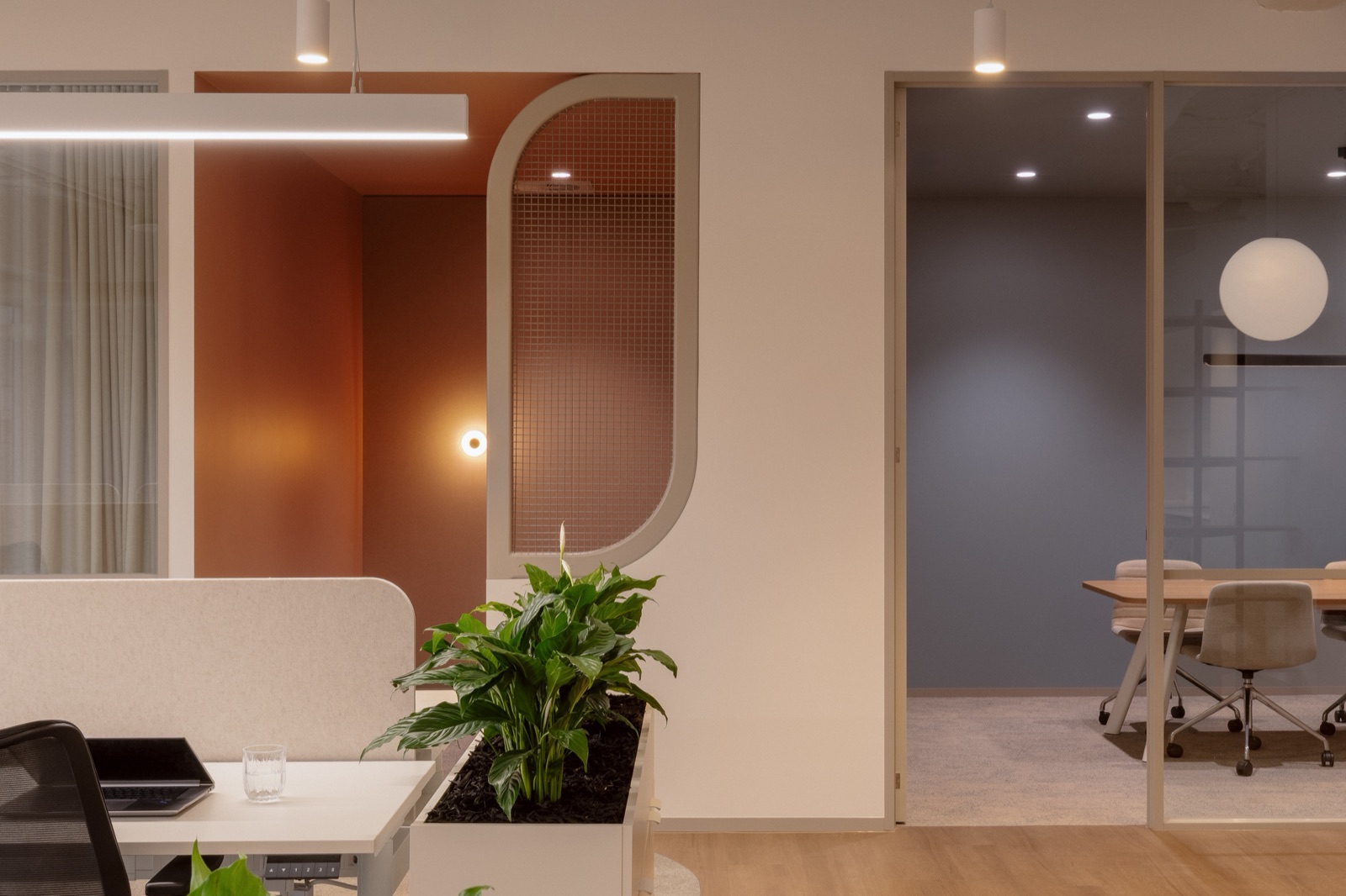 Workspace of the Level 18 spec suite, with planting and the meeting room beyond